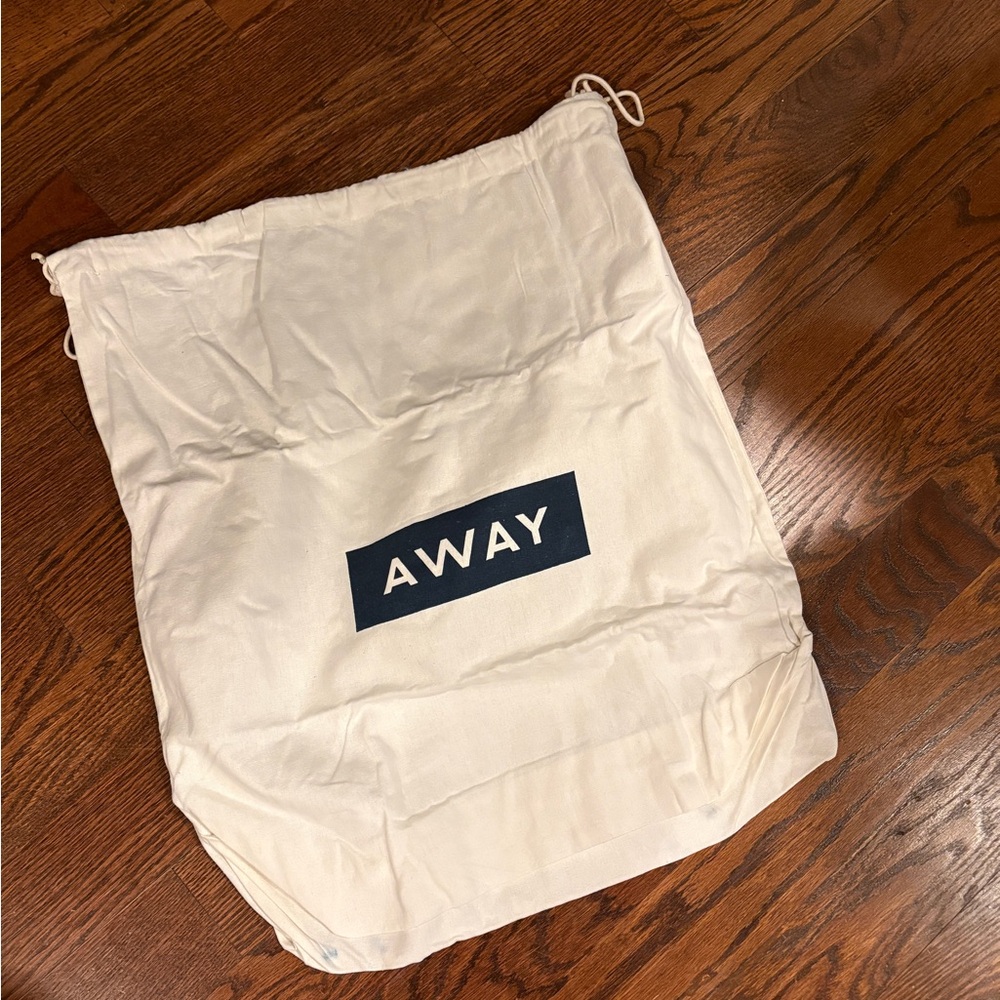Away Ivory Travel Bag - dust bag 23” x 20”
